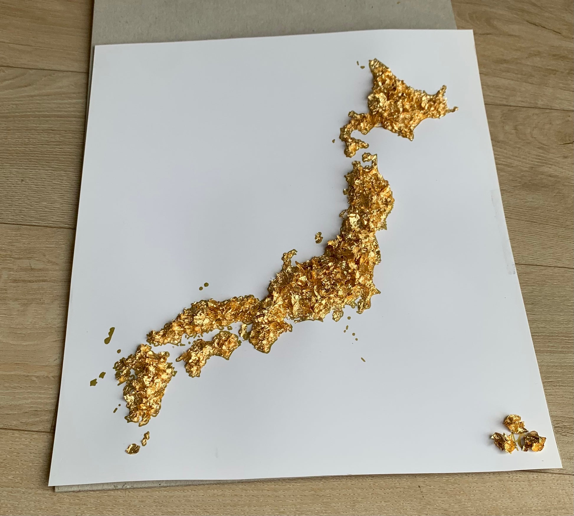 Tableau du Japon fait en feuilles dorées